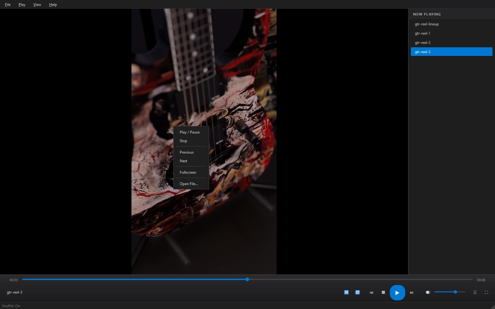 Flux Player right-click menu over a paused guitar reel, shuffle on